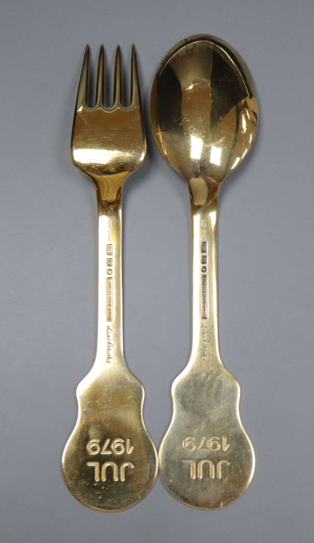 A Danish, Lars Akirke for Michelsen, July, 1979 silver gilt and enamel fork and spoon, 16.5cm, gross 94 grams.